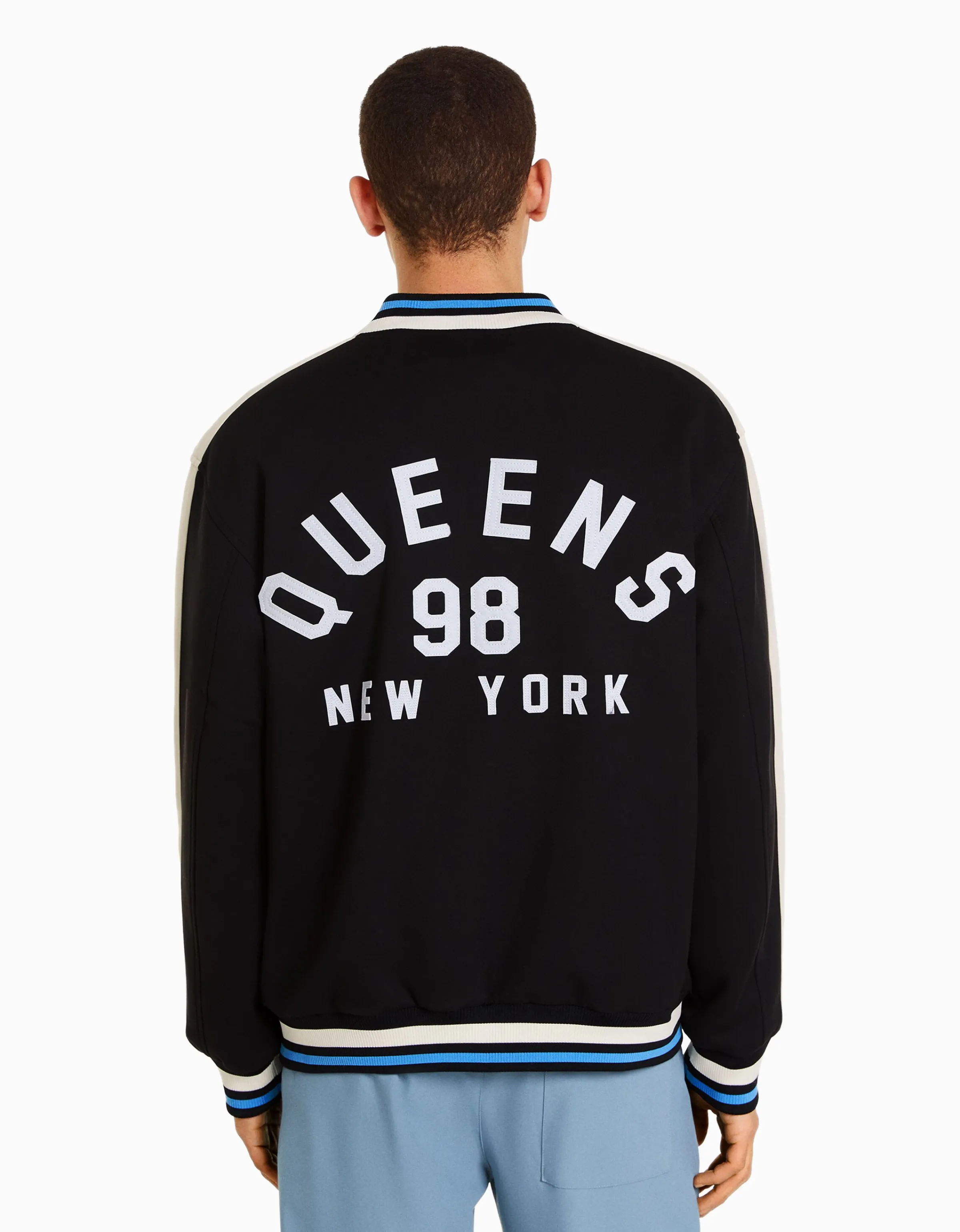 BERSHKA Cazadora efecto ante parche Negro Store